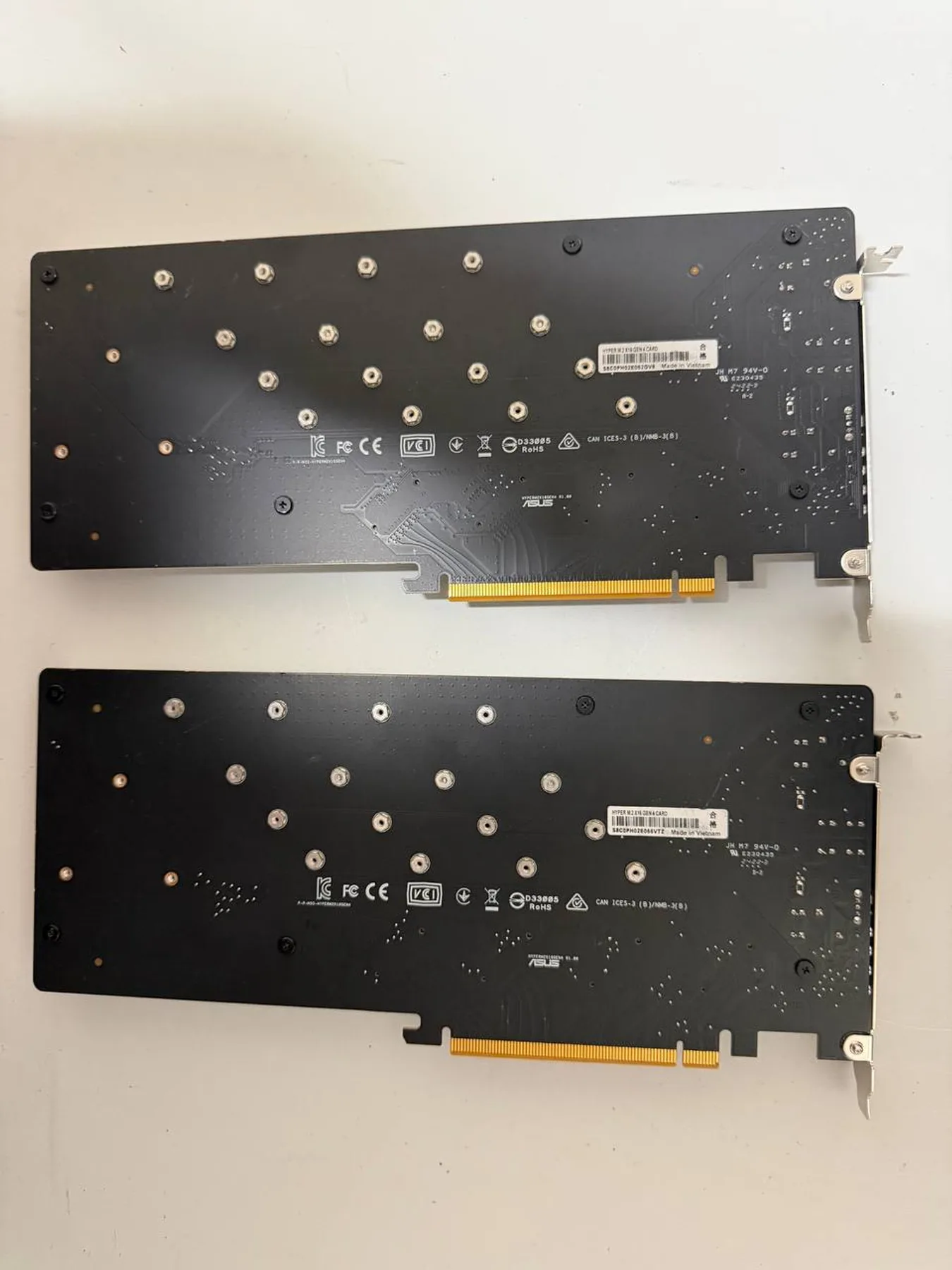 Back of two ASUS Hyper M.2 x16 Gen 4 expansion cards