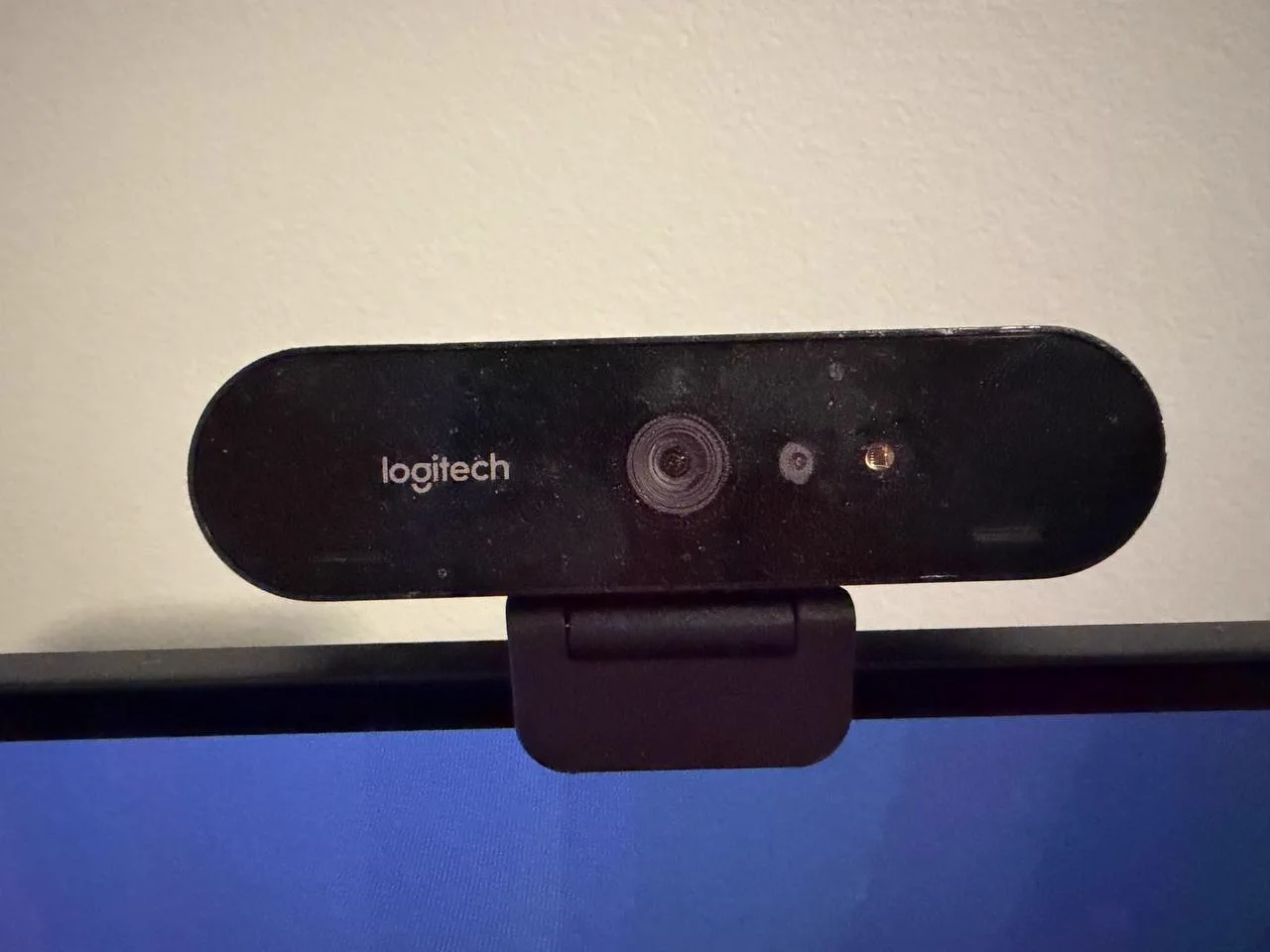 Logitech Brio webcam mounted on a monitor