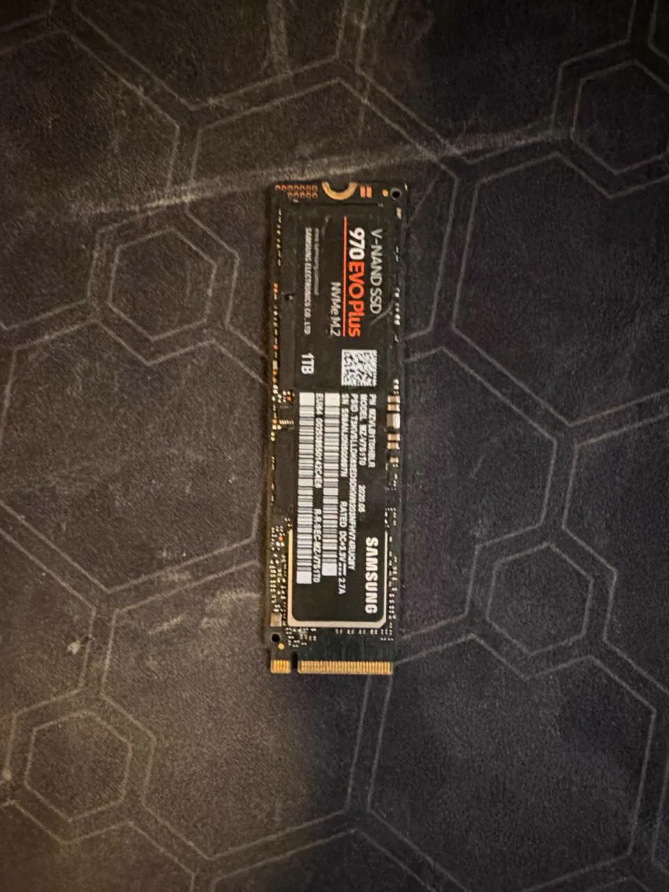 Samsung 970 EVO Plus 1TB NVMe SSD photographed from a second angle