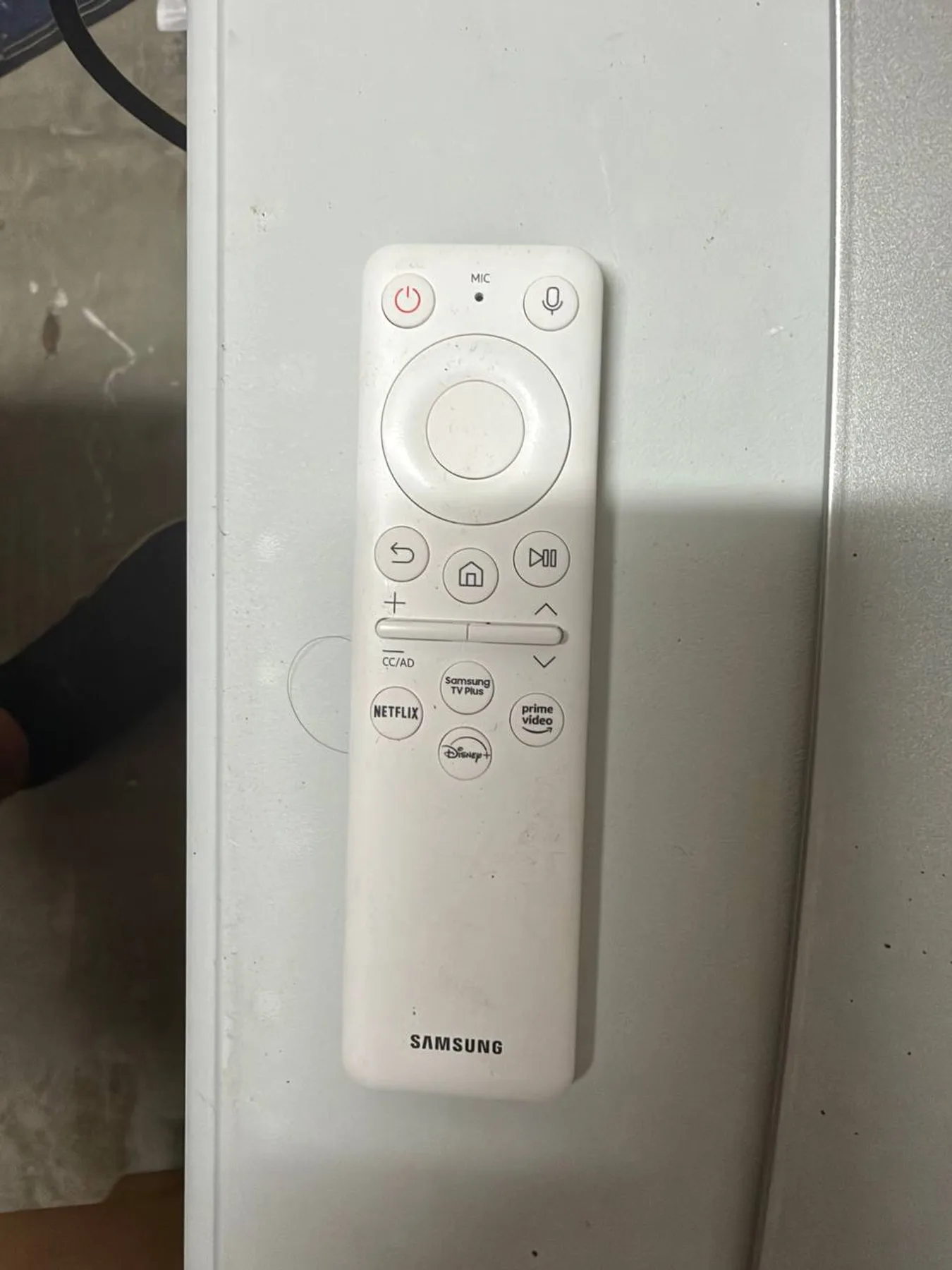 Samsung Odyssey OLED G9 with included remote control