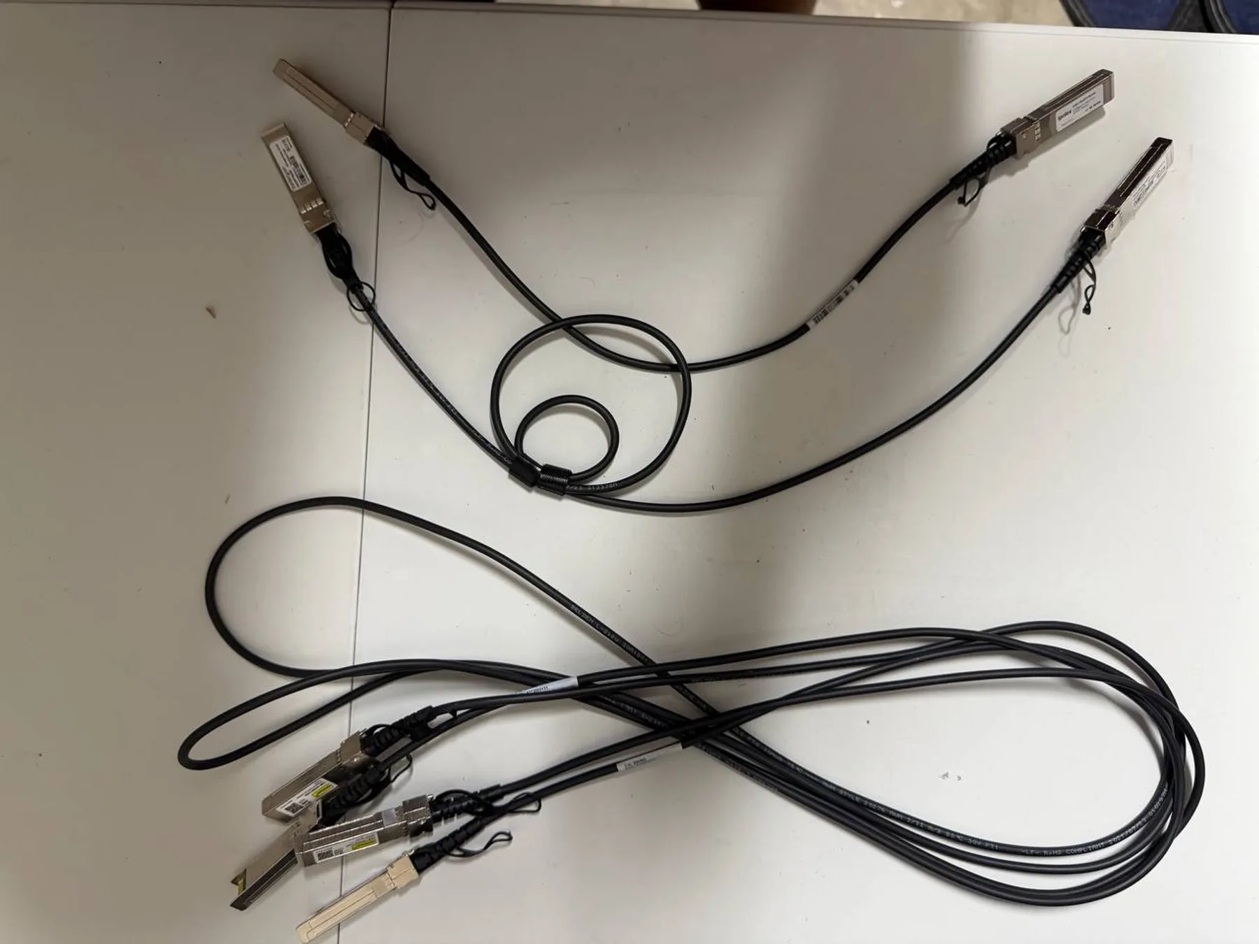 Four SFP+ direct-attach copper network cables