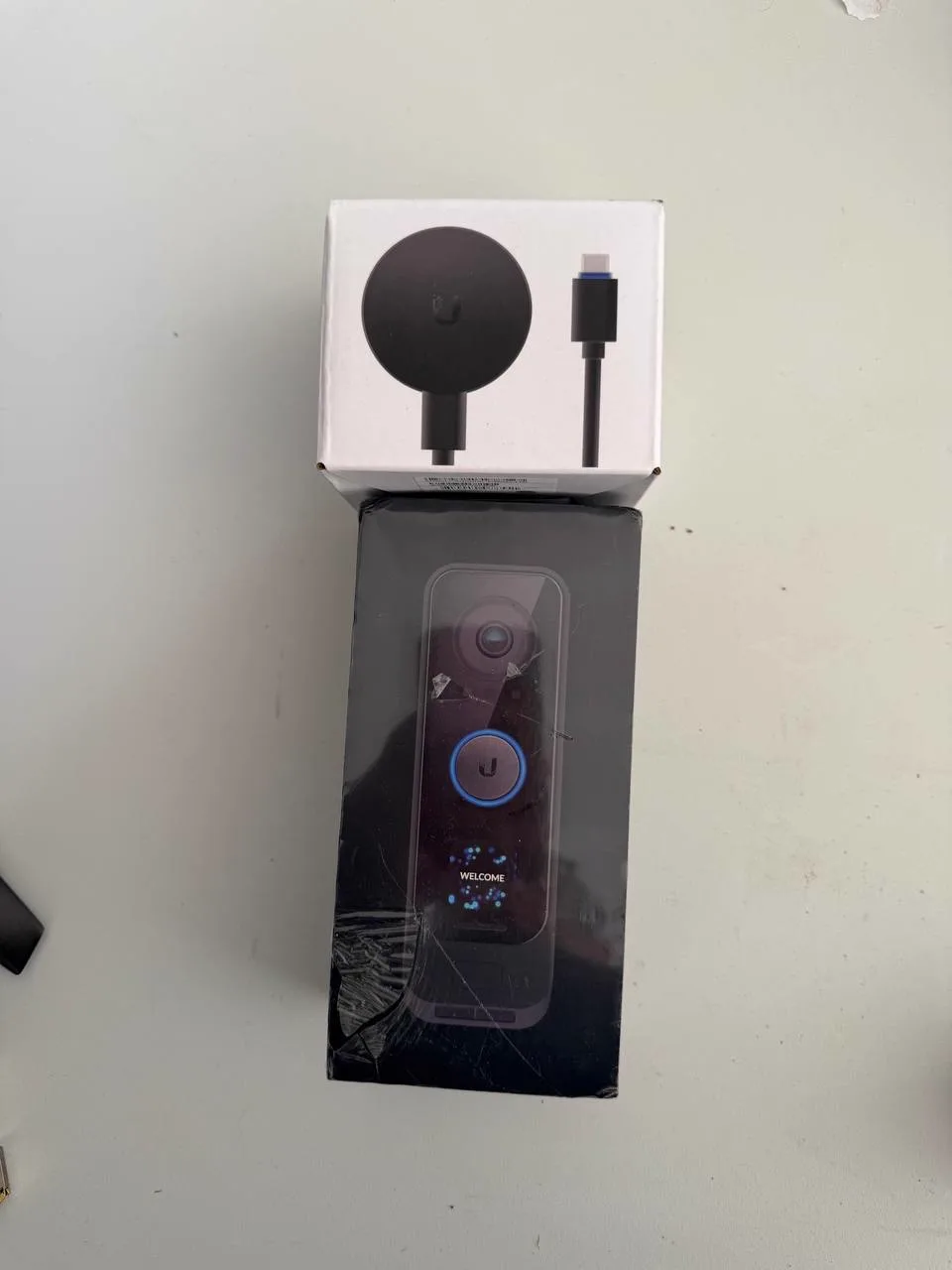 Sealed UniFi G4 Doorbell Pro and G4 Doorbell Pro AC Adapter retail boxes