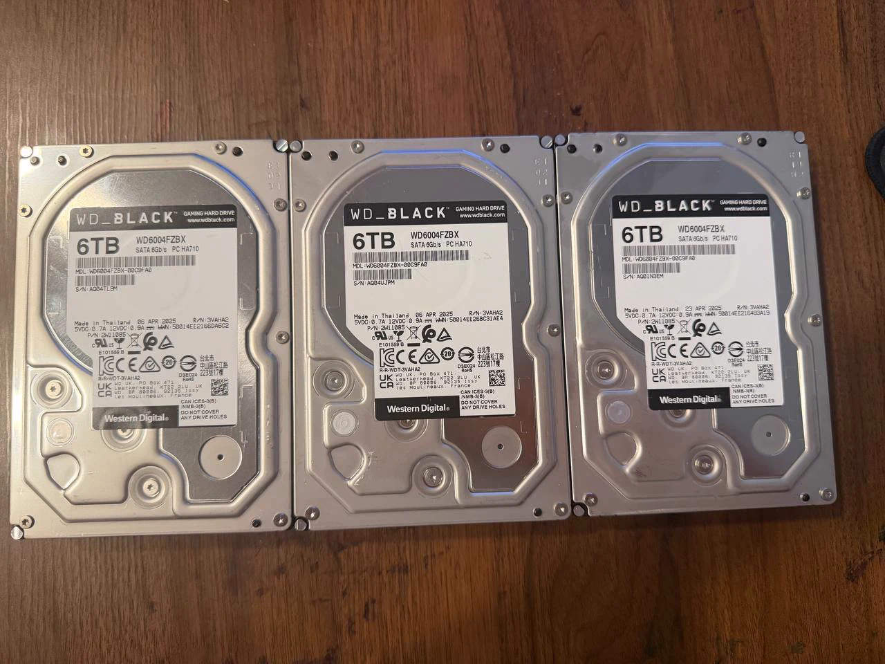 Three actual WD Black WD6004FZBX 6TB hard drives